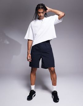 ASOS DESIGN ASOS DESIGN mid length pleated shorts in navy
