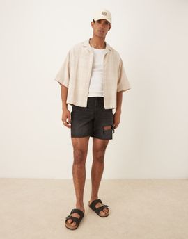 ASOS DESIGN ASOS DESIGN mid length slim denim shorts with rips in black