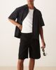 ASOS DESIGN ASOS DESIGN mid length wide denim shorts with tie front in black wash - 2