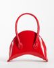 ASOS DESIGN ASOS DESIGN mini structured croissant clutch bag in red - 1