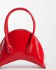 ASOS DESIGN ASOS DESIGN mini structured croissant clutch bag in red - 4
