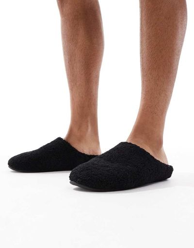 ASOS DESIGN ASOS DESIGN mule slippers in black borg