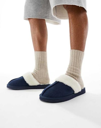 ASOS DESIGN ASOS DESIGN mule slippers in navy suede with faux shearling lining