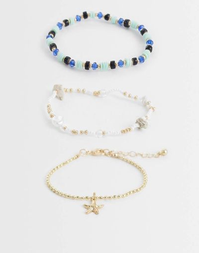ASOS DESIGN ASOS DESIGN multi-pack of beaded bracelets in blue and gold tone