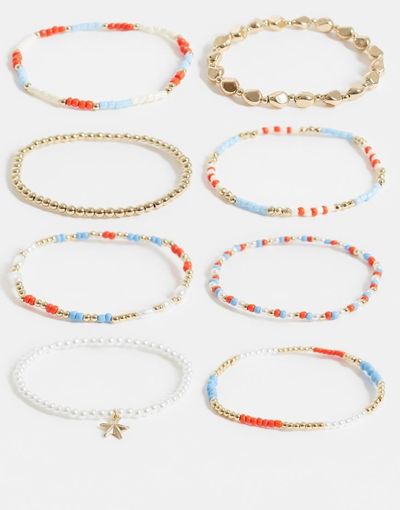 ASOS DESIGN ASOS DESIGN multi-pack of stretch bangles in gold tone and blue-Silver