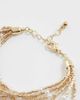 ASOS DESIGN ASOS DESIGN multi-row bracelet with bead and faux pearl design in gold tone - 2
