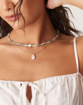 ASOS DESIGN ASOS DESIGN multi-row necklace with beads and faux pearl pendants in blue and gold tone