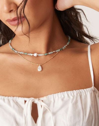 ASOS DESIGN ASOS DESIGN multi-row necklace with beads and faux pearl pendants in blue and gold tone