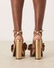 ASOS DESIGN ASOS DESIGN Nala oversized bow platform heel sandals in gold - 3
