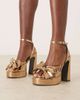 ASOS DESIGN ASOS DESIGN Nala oversized bow platform heel sandals in gold - 4
