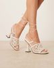 ASOS DESIGN ASOS DESIGN Nina woven tie leg high heel sandals in ecru-White - 1