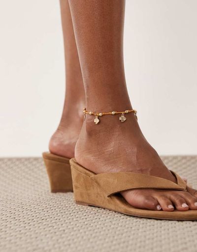 ASOS DESIGN ASOS DESIGN orange cord anklet with fish charms in gold tone