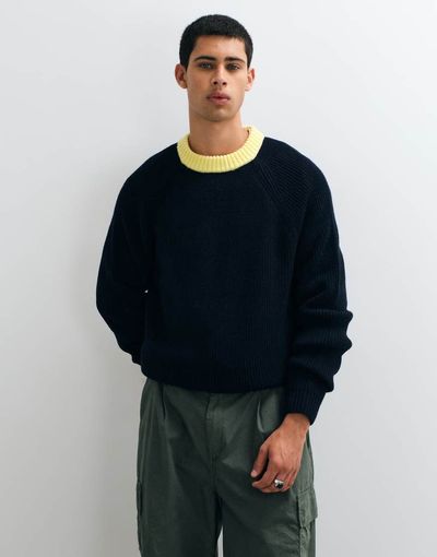 ASOS DESIGN ASOS DESIGN oversized crew neck ringer sweater in black with yellow contrast neck