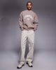 ASOS DESIGN ASOS DESIGN oversized crew neck washed sweatshirt with print detail in brown - 2