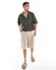 ASOS DESIGN ASOS DESIGN oversized deep v polo in khaki texture-Green - 4