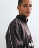 ASOS DESIGN ASOS DESIGN oversized half zip sweatshirt with self elasticated hem, piping and print in brown - 4