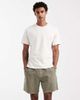 ASOS DESIGN ASOS DESIGN oversized jersey short with back pocket in dark green - 1