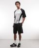 ASOS DESIGN ASOS DESIGN oversized jersey shorts with piping in scuba-style fabric in black - 1