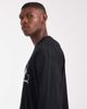 ASOS DESIGN ASOS DESIGN oversized long sleeve T-shirt with sports graphic in black - 4