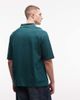 ASOS DESIGN ASOS DESIGN oversized polo shirt with cut and sew paneling and sporty graphics in dark green - 4