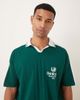 ASOS DESIGN ASOS DESIGN oversized polo with sports chest graphic in green-Multi - 1
