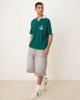 ASOS DESIGN ASOS DESIGN oversized polo with sports chest graphic in green-Multi - 2