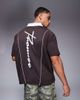 ASOS DESIGN ASOS DESIGN oversized polo with sports graphics and airtex paneling in brown - 2