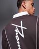 ASOS DESIGN ASOS DESIGN oversized polo with sports graphics and airtex paneling in brown - 4
