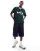 ASOS DESIGN ASOS DESIGN oversized polo with sports graphics and airtex paneling in dark green - 4