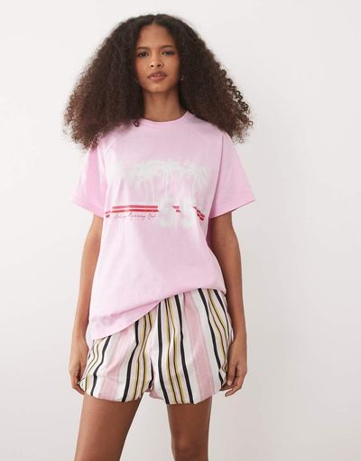 ASOS DESIGN ASOS DESIGN oversized raglan sleeve T-shirt with Palm Springs sports graphic in pink-Multi