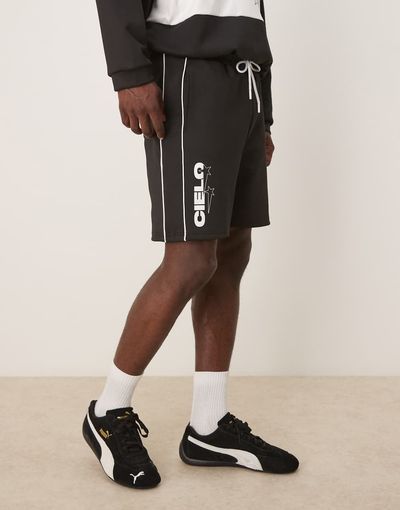 ASOS DESIGN ASOS DESIGN oversized scuba-style fabric shorts with print in black - part of a set