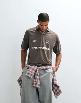 ASOS DESIGN ASOS DESIGN oversized sporty polo shirt with football high build graphic in brown