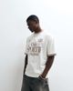 ASOS DESIGN ASOS DESIGN oversized T-shirt with Club Sportif graphic and tipping in cream-White - 4