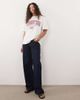 ASOS DESIGN ASOS DESIGN oversized T-shirt with Manhattan Athletics Dept graphic in white and red - 2