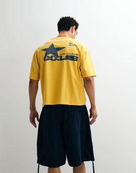 ASOS DESIGN ASOS DESIGN oversized T-shirt with street graphic in yellow wash