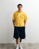 ASOS DESIGN ASOS DESIGN oversized T-shirt with street graphic in yellow wash - 4