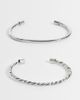 ASOS DESIGN ASOS DESIGN pack of 2 cuff bracelets with plain and twist detail in silver tone - 1