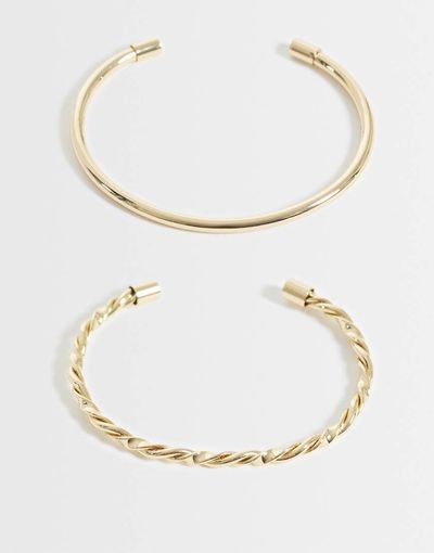 ASOS DESIGN ASOS DESIGN pack of 2 cuff bracelets with plain and twist detailing in gold tone