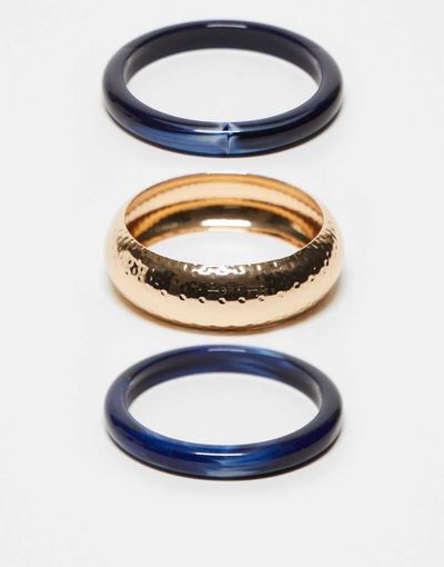 ASOS DESIGN ASOS DESIGN pack of 3 bangles with dark blue resin detail in gold tone