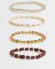 ASOS DESIGN ASOS DESIGN pack of 4 bracelets with mixed beads in amber tones-Silver - 1