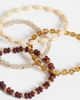 ASOS DESIGN ASOS DESIGN pack of 4 bracelets with mixed beads in amber tones-Silver - 3