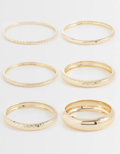 ASOS DESIGN ASOS DESIGN pack of mixed stacking bangles in gold tone