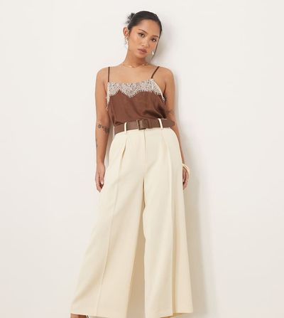 ASOS DESIGN ASOS DESIGN Petite tailored ankle grazer pants with PU belt in cream-No color