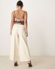 ASOS DESIGN ASOS DESIGN Petite tailored ankle grazer pants with PU belt in cream-No color - 3