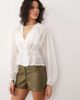 ASOS DESIGN ASOS DESIGN pu mid rise shorts in khaki-Green - 2