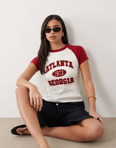 ASOS DESIGN ASOS DESIGN raglan baby tee with atlanta sport graphic in cream and burgundy-White