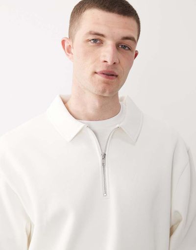 ASOS DESIGN ASOS DESIGN relaxed 1/4 zip sweatshirt with collar in ecru-White