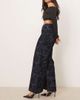 ASOS DESIGN ASOS DESIGN relaxed flare jeans with paisley flock in mid blue - 2