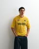 ASOS DESIGN ASOS DESIGN relaxed knit soccer‑style notch neck polo shirt with embroidery in yellow - 1