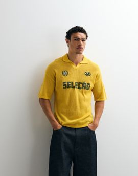 ASOS DESIGN ASOS DESIGN relaxed knit soccer‑style notch neck polo shirt with embroidery in yellow